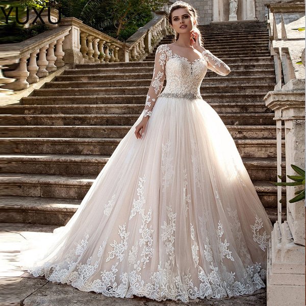 2022 New Dubai Elegant Long Sleeves A-line Wedding Dresses Sheer Crew Neck Lace Appliques Beaded Vestios De Novia boho Bridal Gowns with Buttons