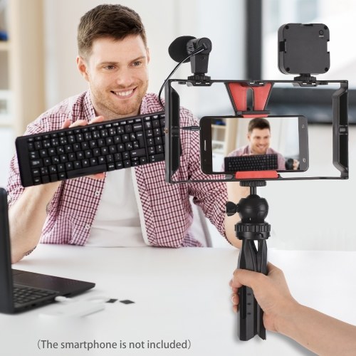 Andoer Smartphone Video Rig Vlog Kit comprenant une cage pour smartphone avec pince pour téléphone 3 supports de chaussures froides + Mini lampe vidéo LED rechargeable 5600K + Microphone + Trépied de bureau + Obturateur à distance pour l'enregistrement vi